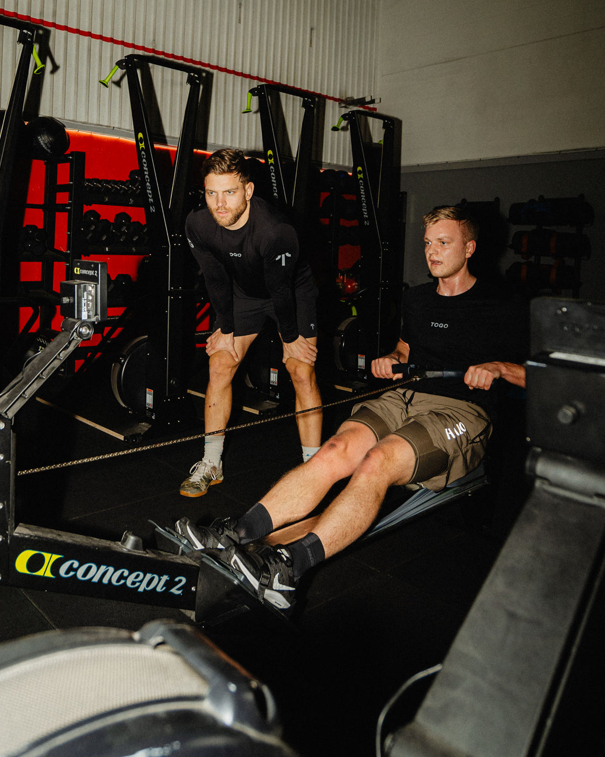 Two men working out in a gym